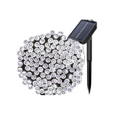 Solar string lights with a solar panel on a white background